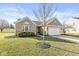 Attractive home with a two-car garage, landscaped front yard, and a mix of brick and siding details at 481 Autumn Springs Ct, Avon, IN 46123