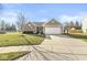 Charming home featuring a two-car garage, well-maintained lawn, and attractive landscaping at 481 Autumn Springs Ct, Avon, IN 46123