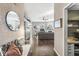 Inviting entryway with hardwood floors, a decorative mirror, and a view into the spacious living area at 481 Autumn Springs Ct, Avon, IN 46123