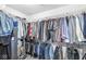 Spacious walk-in closet offers ample storage for clothing and accessories with convenient shelving at 481 Autumn Springs Ct, Avon, IN 46123