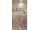 Modern walk-in tub with safety grab bars and decorative tile surround at 4969 Fairway Dr, Avon, IN 46123