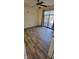 Spacious bedroom featuring stylish laminate flooring and a sliding door at 4969 Fairway Dr, Avon, IN 46123