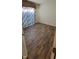 Bedroom with laminate flooring, large window, and neutral walls at 4969 Fairway Dr, Avon, IN 46123