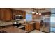 Modern kitchen with stainless steel appliances and updated cabinets at 4969 Fairway Dr, Avon, IN 46123
