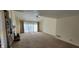 A spacious living room with a fireplace and access to a sliding glass door at 4969 Fairway Dr, Avon, IN 46123