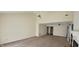 A spacious carpeted living room with high ceilings and a ceiling fan at 4969 Fairway Dr, Avon, IN 46123