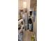 Utility room features a water heater, water softener, and shelving for convenient storage and organization at 4969 Fairway Dr, Avon, IN 46123