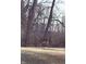 Scenic wooded area showing a deer standing in a field at 4969 Fairway Dr, Avon, IN 46123