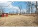 Spacious backyard featuring a storage shed and a wooden fence, great for outdoor activities and relaxation at 5108 Chatham Pl, Indianapolis, IN 46226