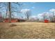 Open backyard of the brick home with a view of the surrounding neighborhood at 5108 Chatham Pl, Indianapolis, IN 46226