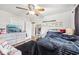 Cozy bedroom with black accents and wood floors, perfect for relaxation and comfort at 5108 Chatham Pl, Indianapolis, IN 46226