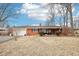 Charming brick ranch home with attached garage and well-maintained lawn, a perfect starter home at 5108 Chatham Pl, Indianapolis, IN 46226