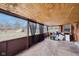 Covered screened deck with wood flooring and an airy atmosphere at 5108 Chatham Pl, Indianapolis, IN 46226