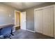 Bedroom featuring neutral walls, carpet, closet, and attached room at 518 Wedgewood Dr, Anderson, IN 46013