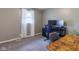 A bedroom with an office setup and a window with natural light at 518 Wedgewood Dr, Anderson, IN 46013
