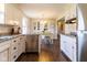 Beautiful kitchen with white cabinets, stainless steel appliances, granite countertops, and hardwood floors at 518 Wedgewood Dr, Anderson, IN 46013