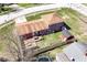 Aerial view of a home with a wooden deck, fenced backyard, and a detached shed at 5414 Honey Comb Ln, Indianapolis, IN 46221