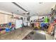 A spacious garage with functional storage, laundry, and ample room for parking and projects at 5414 Honey Comb Ln, Indianapolis, IN 46221
