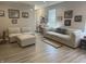 Inviting living room with comfortable seating, stylish decor, and lots of natural light at 6480 E Walton Dr, Camby, IN 46113