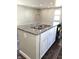 Granite kitchen island with stainless steel sink and faucet at 702 Eberhart Dr, Shelbyville, IN 46176