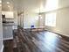 Spacious living room featuring hard surface flooring, and plenty of natural light at 702 Eberhart Dr, Shelbyville, IN 46176