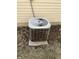 A modern air conditioning unit providing efficient cooling for the property at 734 W 9Th St, Greenfield, IN 46140