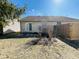 Fenced backyard with a patio area for outdoor activities and relaxation at 734 W 9Th St, Greenfield, IN 46140