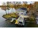 Waterfront house with private dock, boat lift, and slides into the lake; perfect for summer fun and entertaining at 7780 Paw Paw Dr, Nineveh, IN 46164
