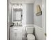 Cozy bathroom features a vanity with marble countertop, and modern fixtures at 7780 Paw Paw Dr, Nineveh, IN 46164
