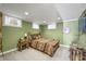 Rustic bedroom with wooden bed frame, natural tones, and ample natural light at 7780 Paw Paw Dr, Nineveh, IN 46164