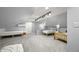Attic bedroom with gray walls, carpeting, and multiple beds perfect for flexible living space at 7780 Paw Paw Dr, Nineveh, IN 46164