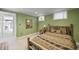Comfortable bedroom with wooden accents and an ensuite entryway at 7780 Paw Paw Dr, Nineveh, IN 46164