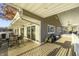 Large deck with outdoor furniture, ideal for entertaining and enjoying the outdoor scenery at 7780 Paw Paw Dr, Nineveh, IN 46164