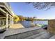 Waterfront dock featuring boat lift, slide, and kayaks, offering endless water activities at 7780 Paw Paw Dr, Nineveh, IN 46164