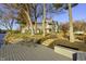 Beautiful lakeside home with multi-level decks, dock, and patio with outdoor seating at 7780 Paw Paw Dr, Nineveh, IN 46164