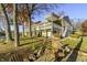 Spacious two-story house with covered decks and beautifully landscaped yard on the lake at 7780 Paw Paw Dr, Nineveh, IN 46164