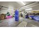 Spacious garage featuring storage for recreational water equipment at 7780 Paw Paw Dr, Nineveh, IN 46164