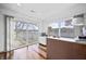 Bright office with lake views, hardwood floors, and plenty of natural light at 7780 Paw Paw Dr, Nineveh, IN 46164