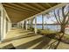 Spacious covered patio ideal for relaxing with lake views at 7780 Paw Paw Dr, Nineveh, IN 46164