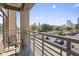 Private balcony with seating and overlooks neighborhood with convenient parking at 802 N Meridian St # 204, Indianapolis, IN 46204