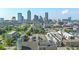 A wide angle aerial shot showcasing the Indianapolis skyline and surrounding buildings on a clear, sunny day at 802 N Meridian St # 204, Indianapolis, IN 46204