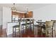 Modern kitchen featuring stainless steel appliances, dark wood cabinets, and a breakfast bar with seating at 802 N Meridian St # 204, Indianapolis, IN 46204