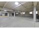 Spacious parking garage with ample room, painted markings, and visible support beams at 802 N Meridian St # 204, Indianapolis, IN 46204