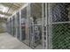 Secure storage units enclosed by metal fencing, providing safe and accessible storage solutions at 802 N Meridian St # 204, Indianapolis, IN 46204