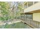Spacious two-level back deck overlooking a lush yard with mature trees, offering a serene outdoor retreat at 8425 N Halyard N Way, Indianapolis, IN 46236