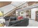 Large living room features a lofted ceiling, staircase, and lots of natural light at 8425 N Halyard N Way, Indianapolis, IN 46236