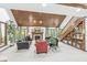 Spacious living room boasts a vaulted ceiling, wood accents, and natural light at 8425 N Halyard N Way, Indianapolis, IN 46236