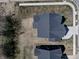 Birds eye view of a home showcasing the backyard and roofline of a property at 8729 Dorill Creek Ln, Indianapolis, IN 46259
