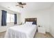 Bright bedroom with white walls and a large window providing natural light at 8820 Yardley Ct # 101, Indianapolis, IN 46268