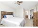 Cozy bedroom featuring a wood bed frame and direct access to a well-lit bathroom at 8820 Yardley Ct # 101, Indianapolis, IN 46268